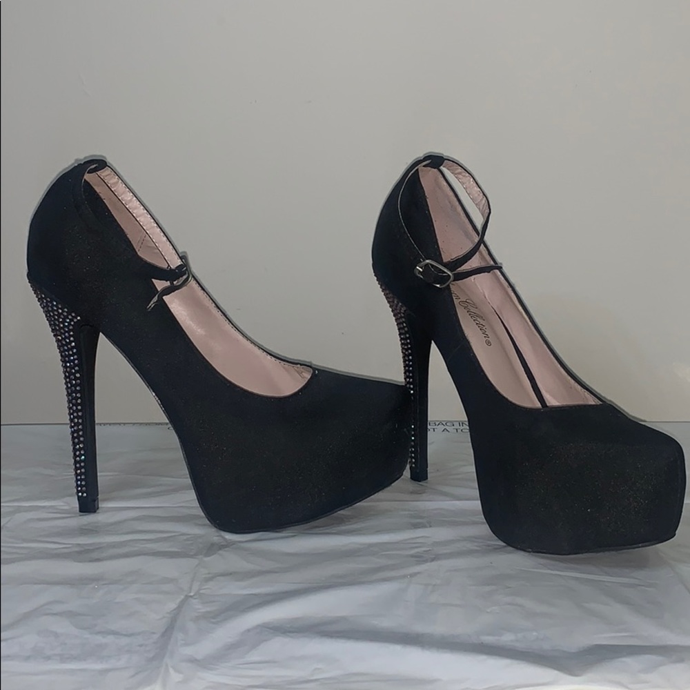 Black pumps with jeweled heels